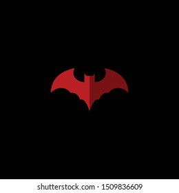 Red silhouette of bat man isolated on black background icon. Halloween decorative element. Logo design inspiration