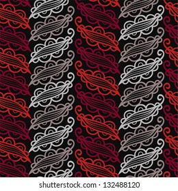 red and silver openwork on black background