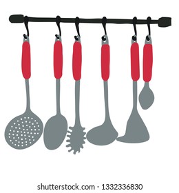 red and silver wall kitchen utensils