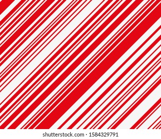 Red slanted lines, diagonal stripes.Texture of Christmas candy canes. Winter holiday decoration. Colorful vector illustration. Xmas greeting card. Christmas gift wrapping. Xmas backdrop.