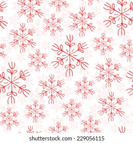 Red snowflakes on white background seamless pattern
