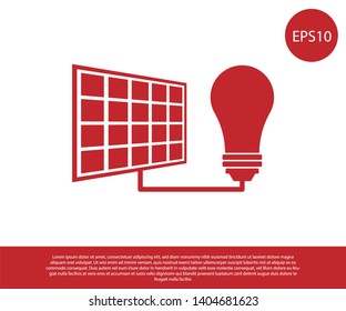Red Solar energy panel and light bulb icon isolated on white background. Vector Illustration