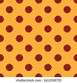 Red Solar system icon isolated seamless pattern on brown background. The planets revolve around the star.  Vector Illustration