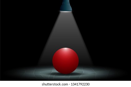 red sphere on the marble floor with spotlight in the dark room