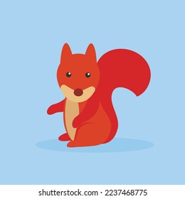 Red squirrel sits and looks away