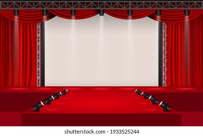 red stage with spotlight and white screen in the hall