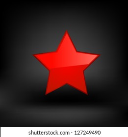 Red star on black background. Vector