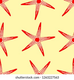 Red starfish pattern on a sandy beach