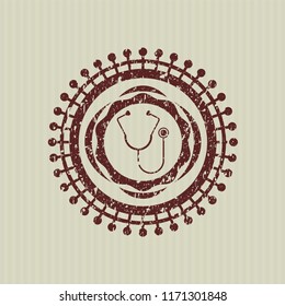 Red stethoscope icon inside distressed with rubber seal texture