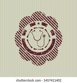 Red stethoscope icon inside distressed with rubber seal texture