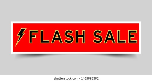 Red sticker label with word flash sale and thunder icon on gray background