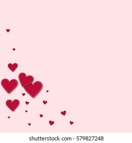 Red stitched paper hearts. Bottom left corner with red stitched paper hearts on light pink background. Vector illustration.