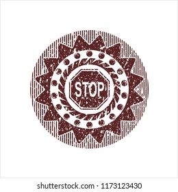 Red stop icon inside distress rubber stamp with grunge texture