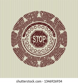 Red stop icon inside distressed with rubber seal texture