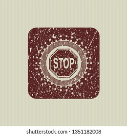 Red stop icon with rubber seal texture