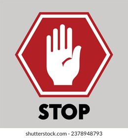 Red stop sign isolated on gray background