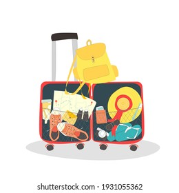 Red suitcase with summer and tourist items on white background