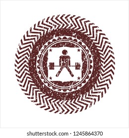 Red sumo deadlift icon inside distressed rubber grunge seal