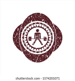 Red sumo deadlift icon inside distress grunge seal