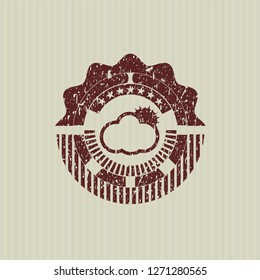 Red sun behind cloud icon inside rubber grunge texture stamp
