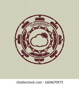 Red sun behind cloud icon inside distress rubber stamp with grunge texture
