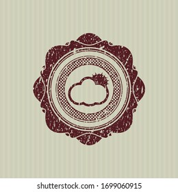 Red sun behind cloud icon inside distressed rubber stamp with grunge texture