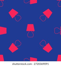 Icono rojo de la lámpara de mesa aislado sin patrón sobre fondo azul. Luz nocturna.  Vector