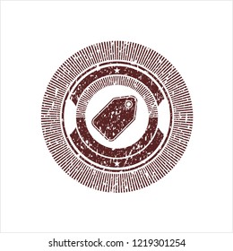 Red tag icon inside rubber grunge stamp