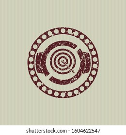 Red target, business icon inside distress rubber stamp