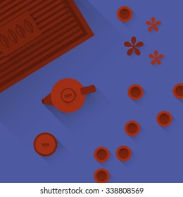 red tea-set on blue background