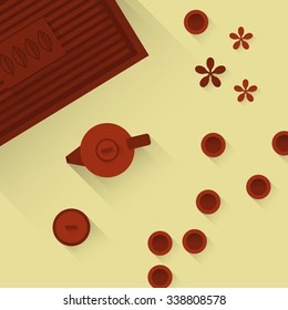 red tea-set on yellow background