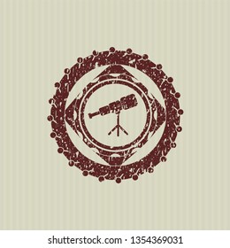 Red telescope icon inside rubber texture