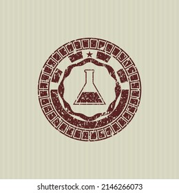 Red test tube icon inside distress rubber seal. 