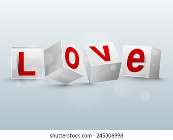 Red text Love on glossy 3D cubes for Happy Valentines Day celebration.