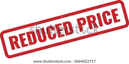 A red textured stamp with the words REDUCED PRICE clearly visible, signifying a price reduction.