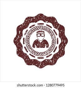 Red thief icon inside distressed with rubber seal texture