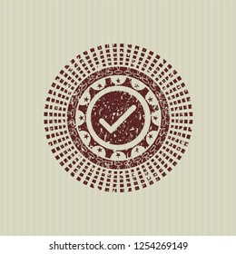 Red tick icon inside distress rubber grunge texture seal