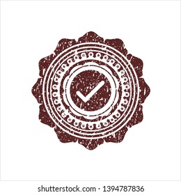 Red tick icon with rubber seal texture