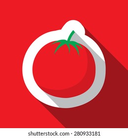 red tomato and long shadow on a red background