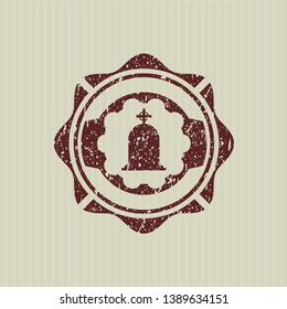 Red tombstone icon inside distressed rubber seal with grunge texture
