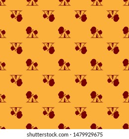 Red Tourist tent with flag icon isolated seamless pattern on brown background. Camping symbol.  Vector Illustration
