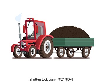 Red tractor with trailer. A pile of manure in the trailer.