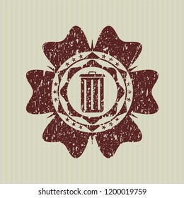 Red trash can icon inside rubber stamp with grunge texture