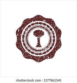 Red tree icon inside grunge seal