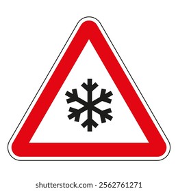 Red triangle road sign warning about ice or snow on the road, indicating dangerous driving conditions.