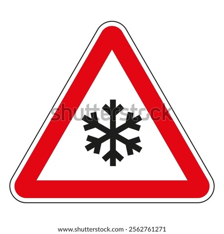 Red triangle road sign warning about ice or snow on the road, indicating dangerous driving conditions.