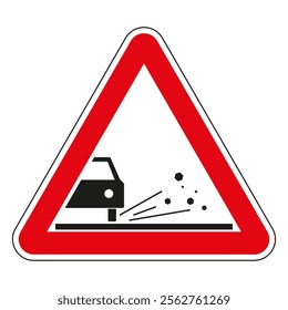 Red triangular road sign warning of loose road surface with gravel or chippings flying from under car wheels.