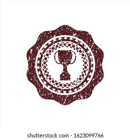 Red trophy icon inside distress grunge seal