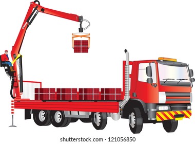 A Red Truck with operator on crane unloading bricks