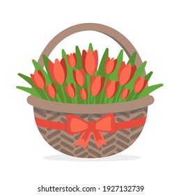 Red tulips in a basket with a red bow.
